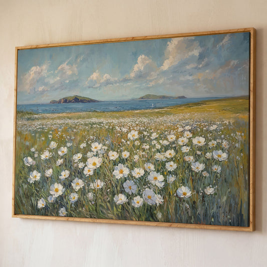 Seaside Landscape Canvas with Wildflowers and Bay shown in white oak floating frame