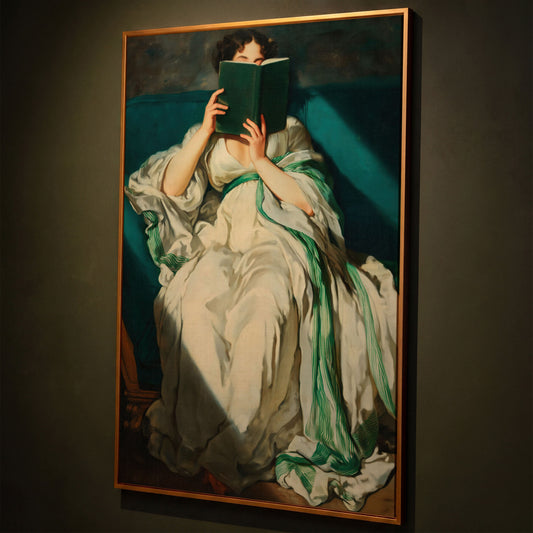 Woman Reading on a Turquoise Sofa. Canvas Wall Art for Book Lovers shown in antique gold floating frame