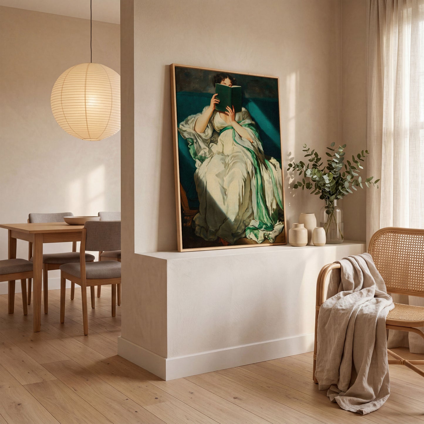 Woman Reading on a Turquoise Sofa. Canvas Wall Art for Book Lovers in white oak floating frame