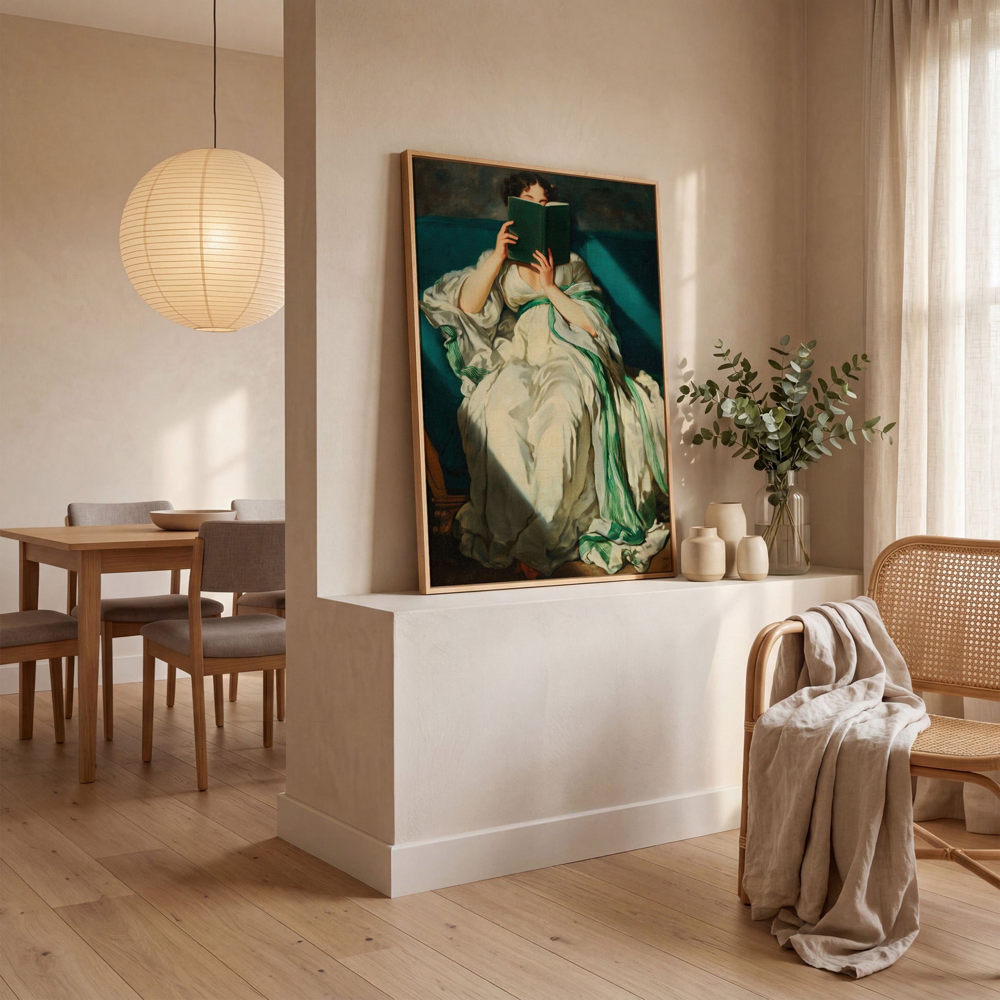 Woman Reading on a Turquoise Sofa. Canvas Wall Art for Book Lovers in white oak floating frame