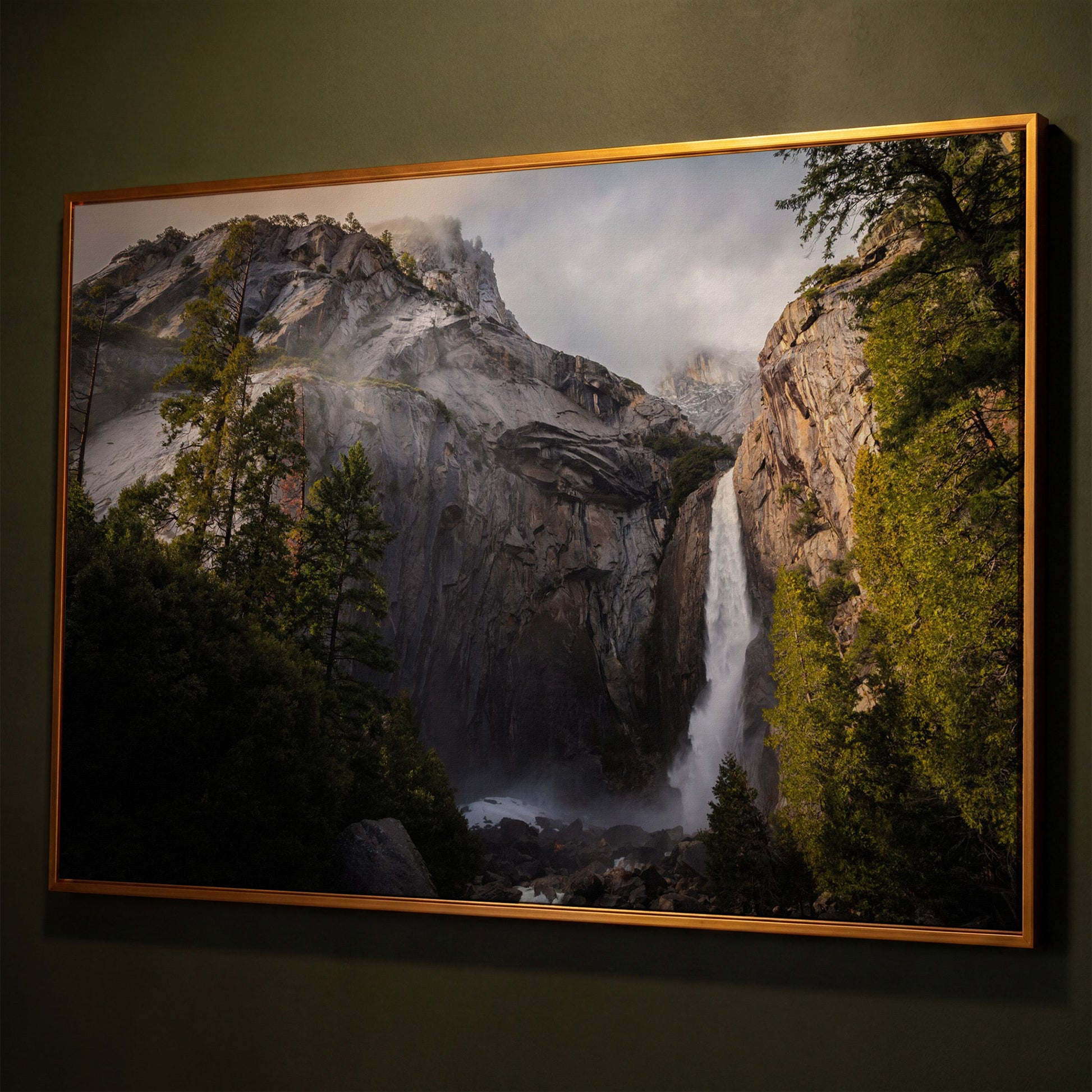 Winter Storm at Yosemite Falls Panoramic Canvas shown in antique gold floating frame