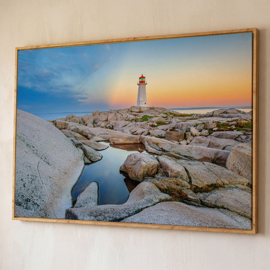 Peggy's Cove Lighthouse Canvas Print | Rocky Nova Scotia Coast shown in white oak floating frame