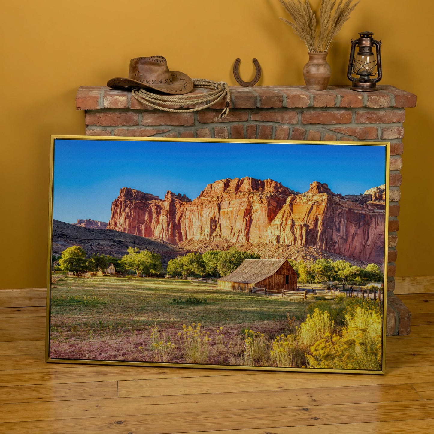 Fruita Barn with Red Rock Cliffs Canvas in yellow gold floating frame