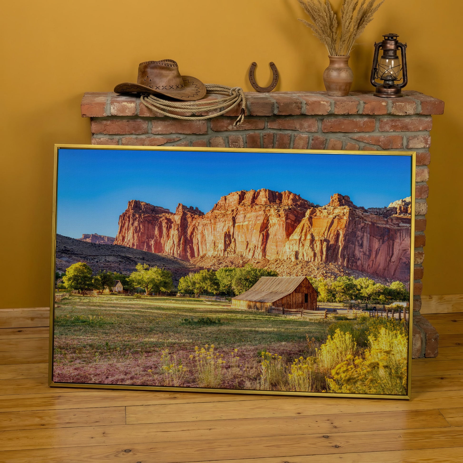 Fruita Barn with Red Rock Cliffs Canvas in yellow gold floating frame
