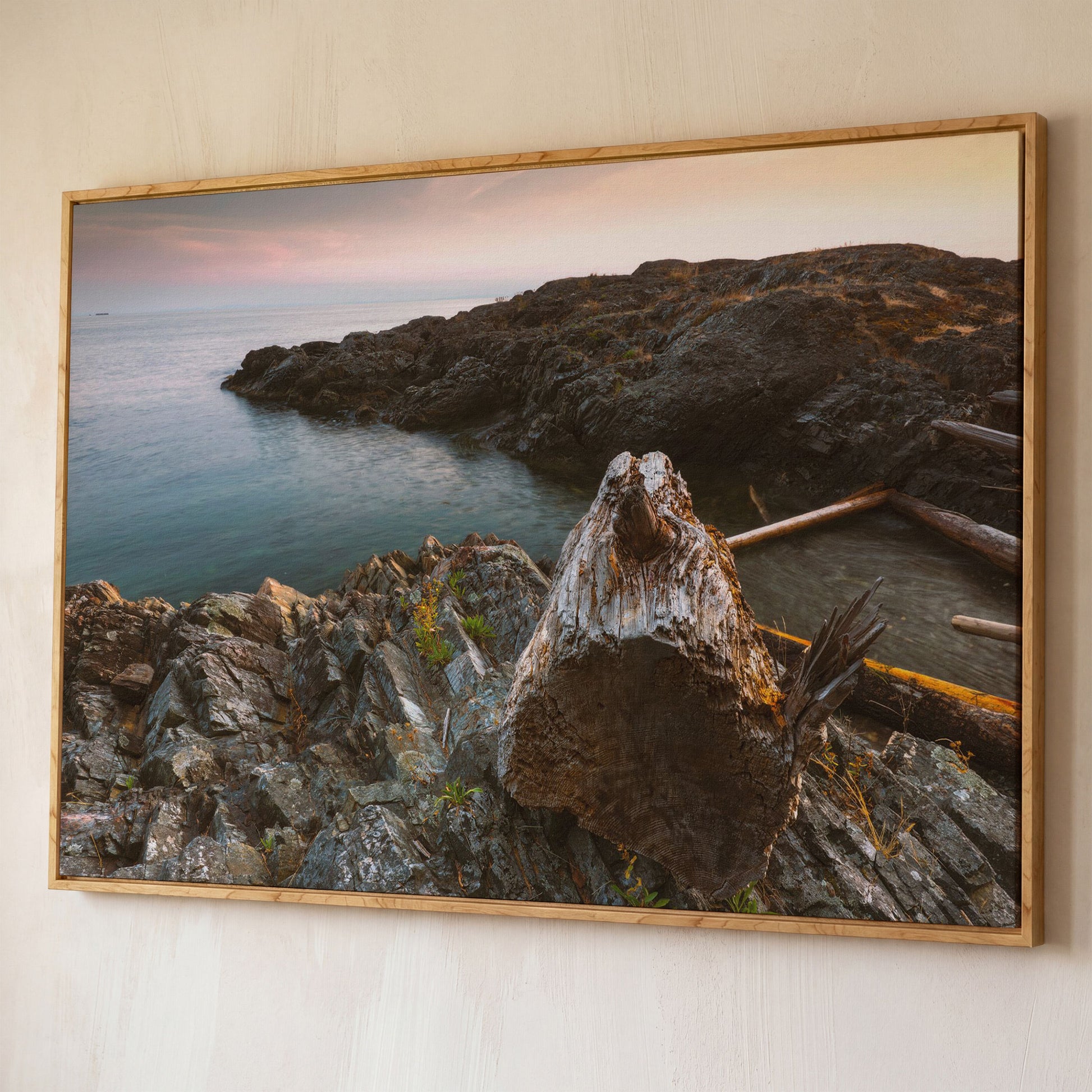 Bowen Island Rocky Shoreline Canvas Print shown in white oak floating frame