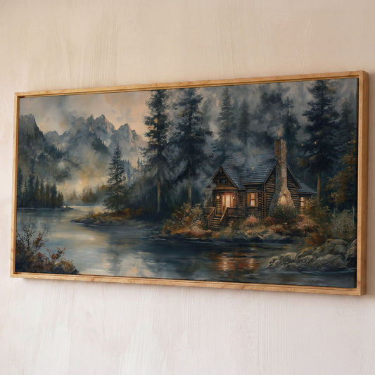 Rustic Riverside Cabin with Misty Mountains Canvas shown in white oak floating frame