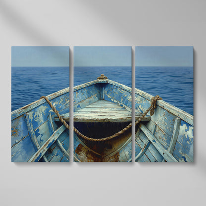 Old Rowboat Canvas Print. Weathered Nautical Seascape as 3-panel split version