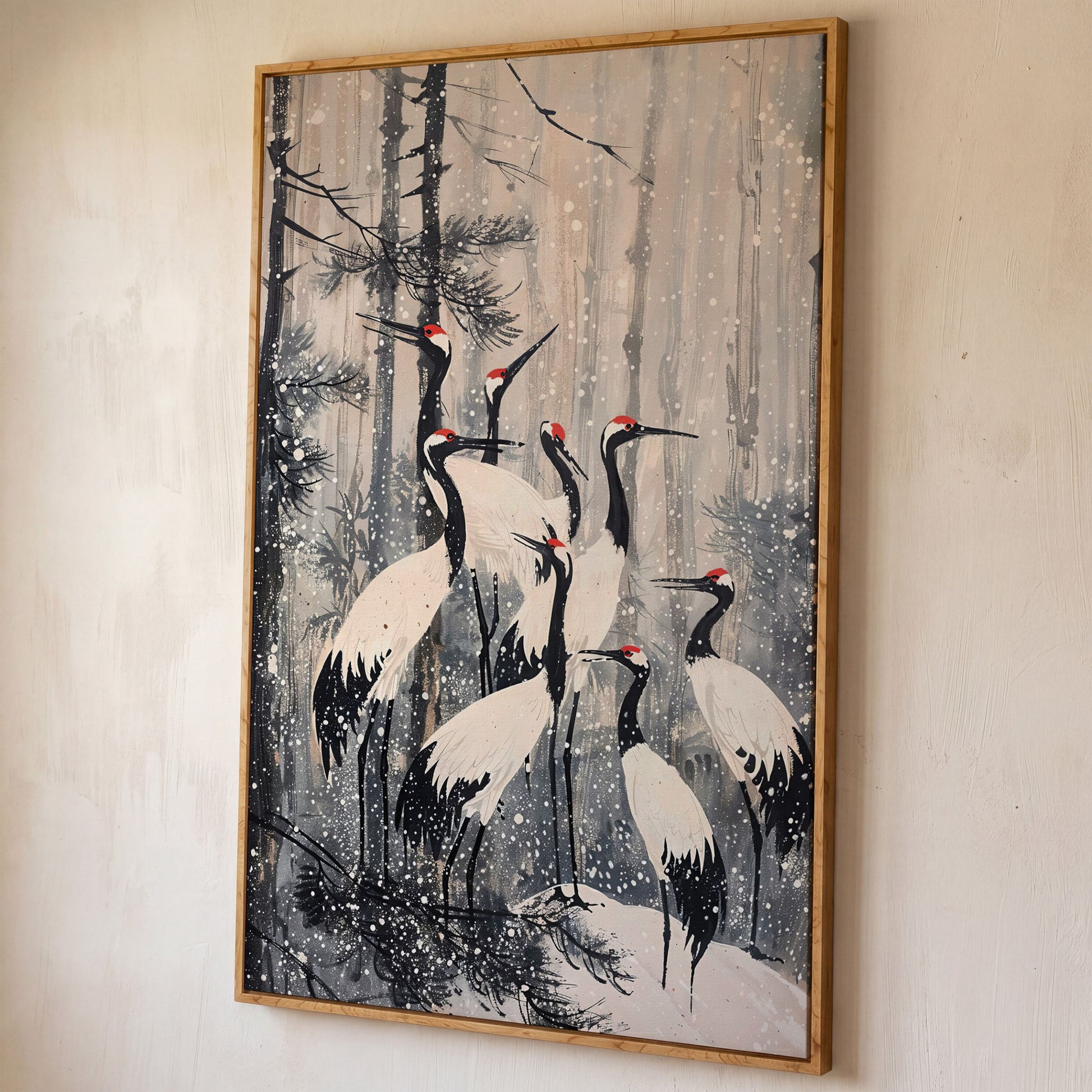 Cranes in Snowy Forest Canvas Print shown in white oak floating frame