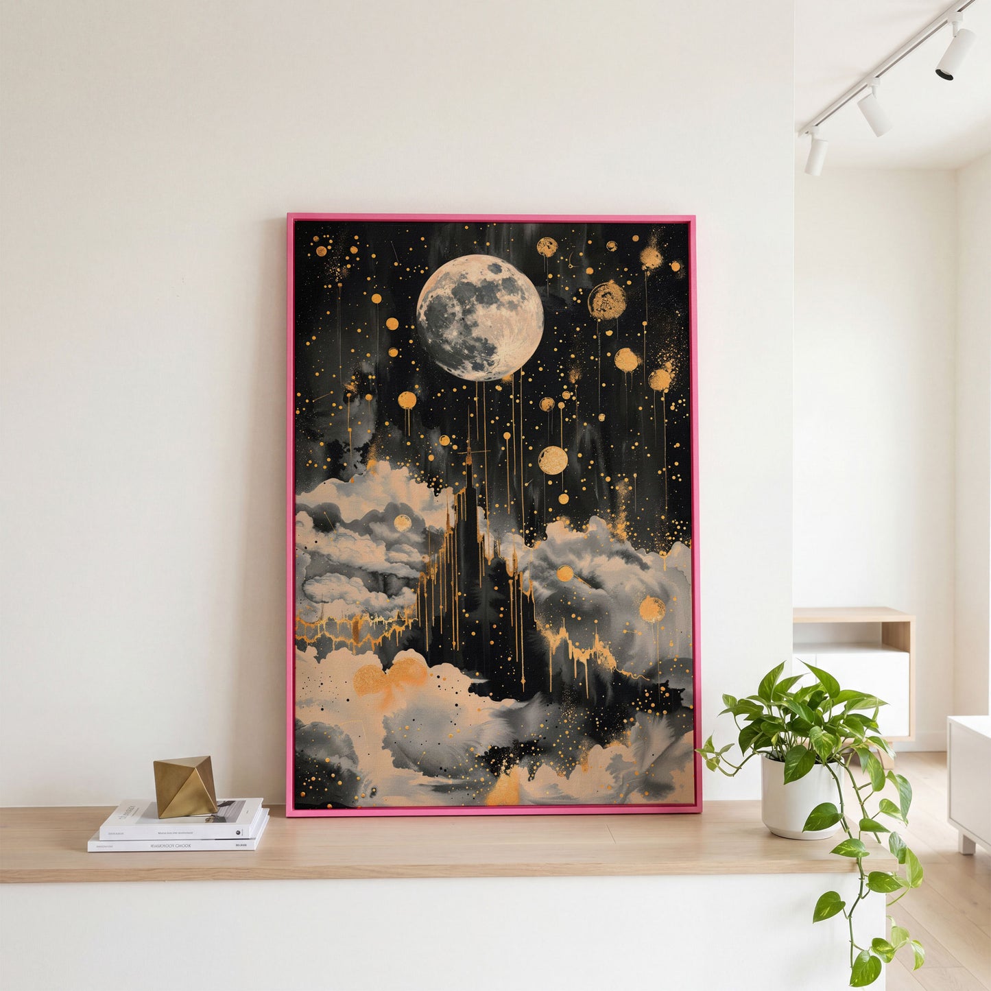Celestial Moon Canvas Wall Art in Charcoal and Gold in pink floating frame