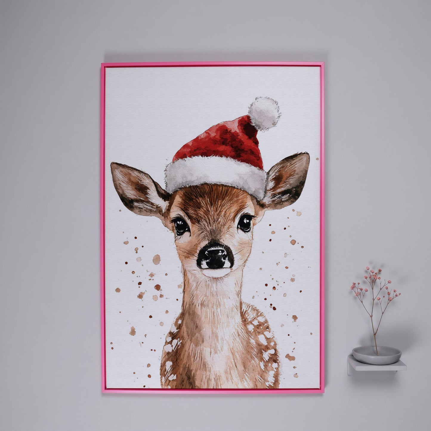Reindeer in Santa Hat Canvas Print in pink floating frame