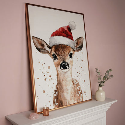 Reindeer in Santa Hat Canvas Print in rose gold floating frame