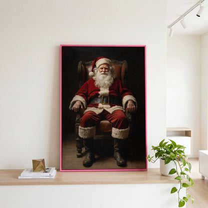 Santa in Armchair Canvas Print in pink floating frame