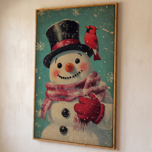 Snowman and Cardinal Folk Art Canvas shown in white oak floating frame