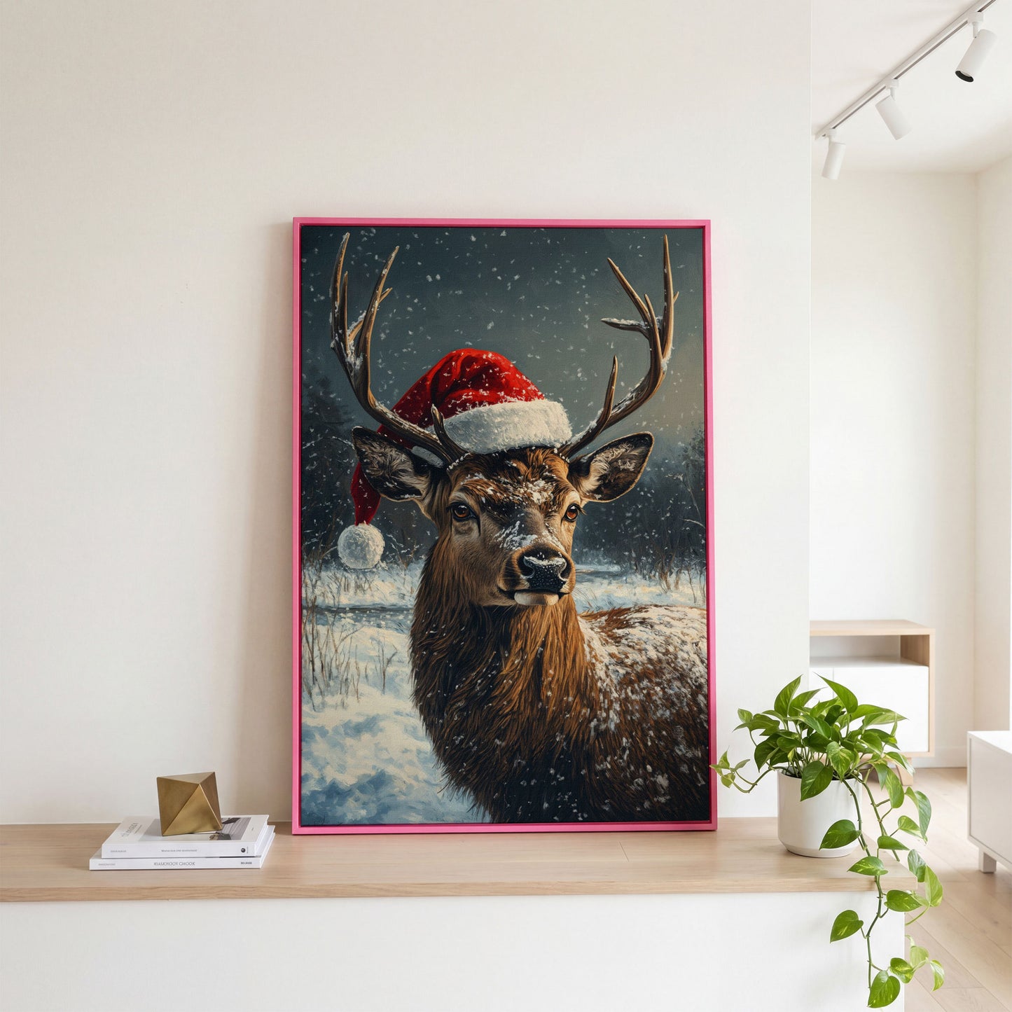 Stag in Santa Hat Canvas Print in pink floating frame