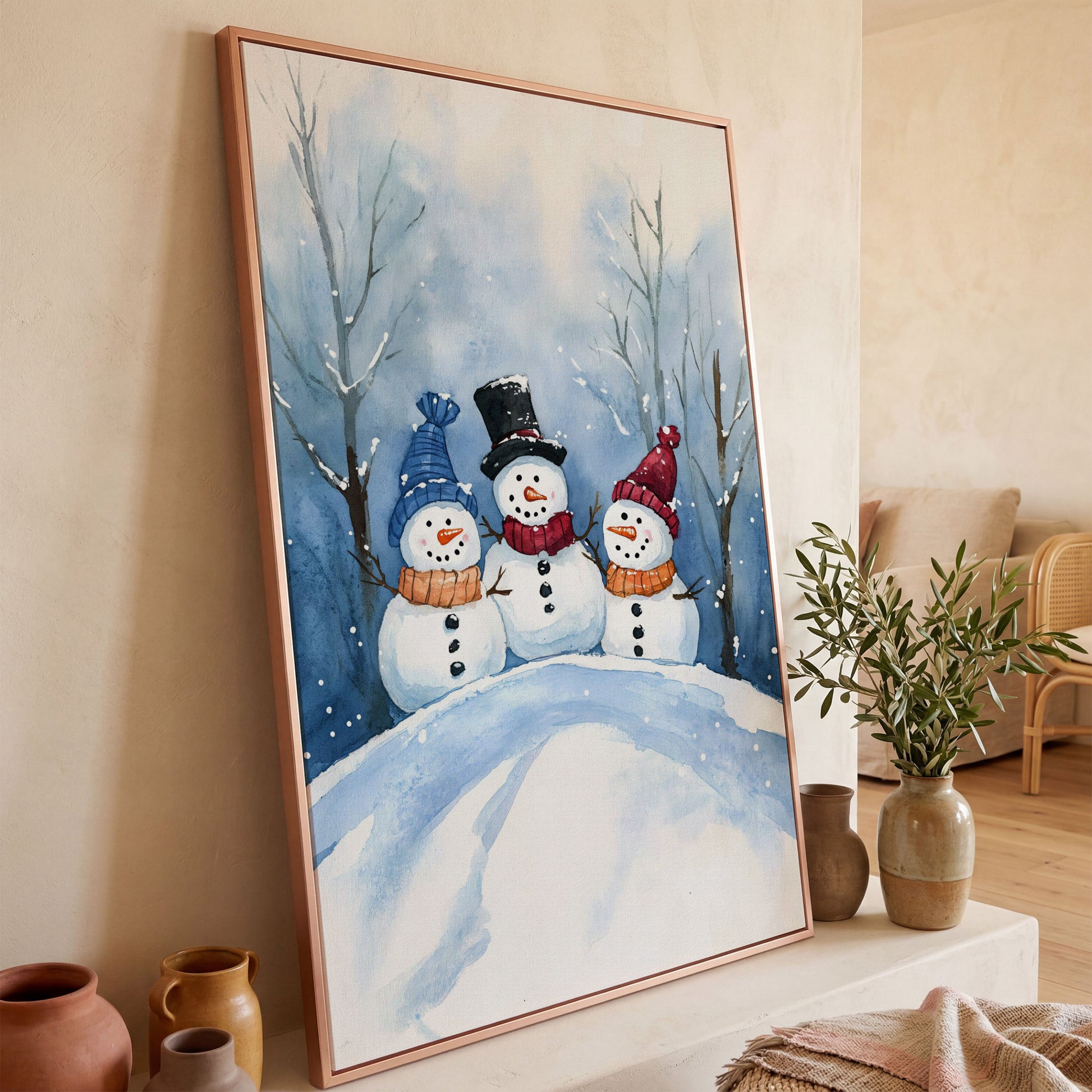 Three Snowmen on a Hill Canvas Print in rose gold floating frame