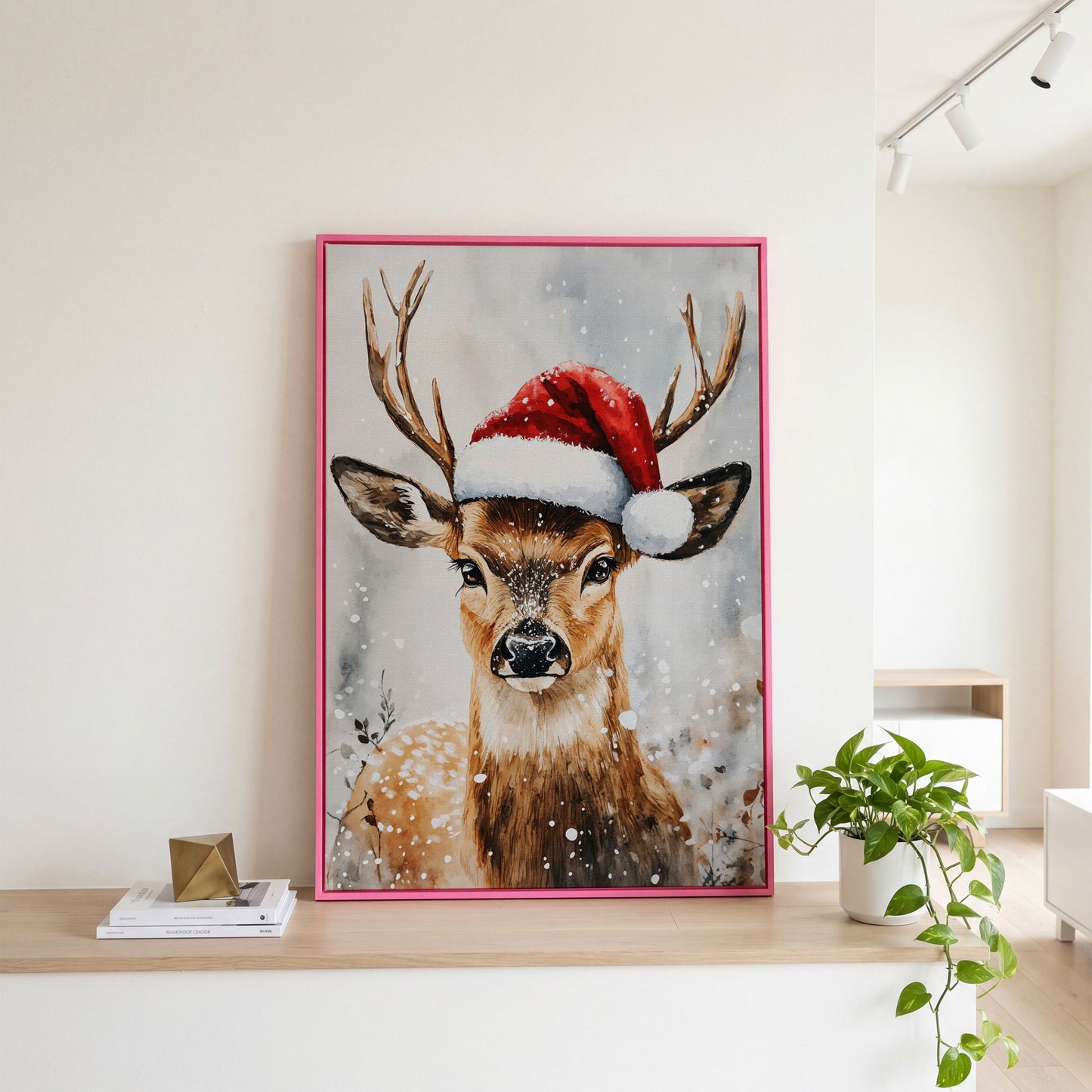 Festive Reindeer with Santa Hat Canvas Print in pink floating frame