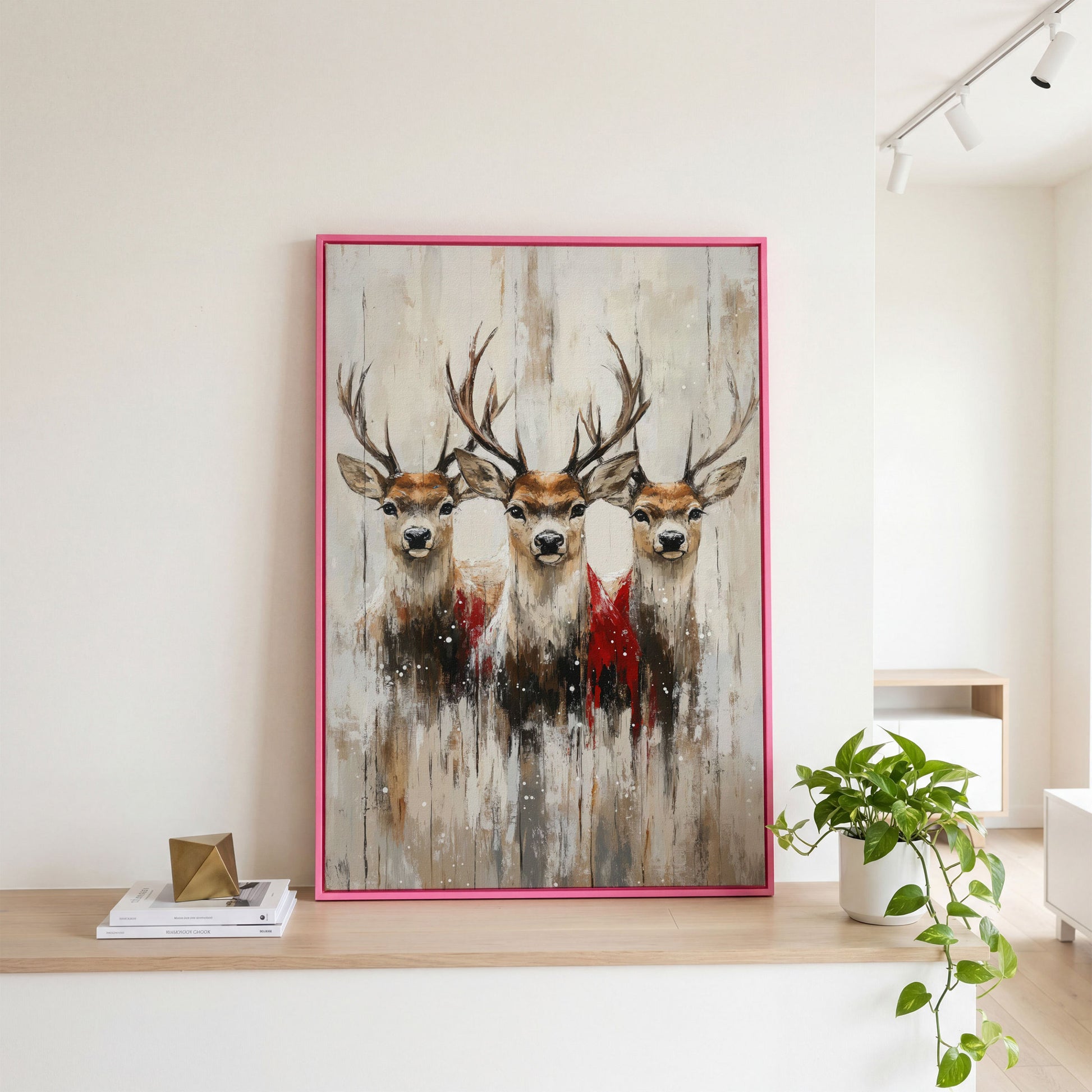 Three Reindeer Canvas Print in Burnt Umber and Cream in pink floating frame