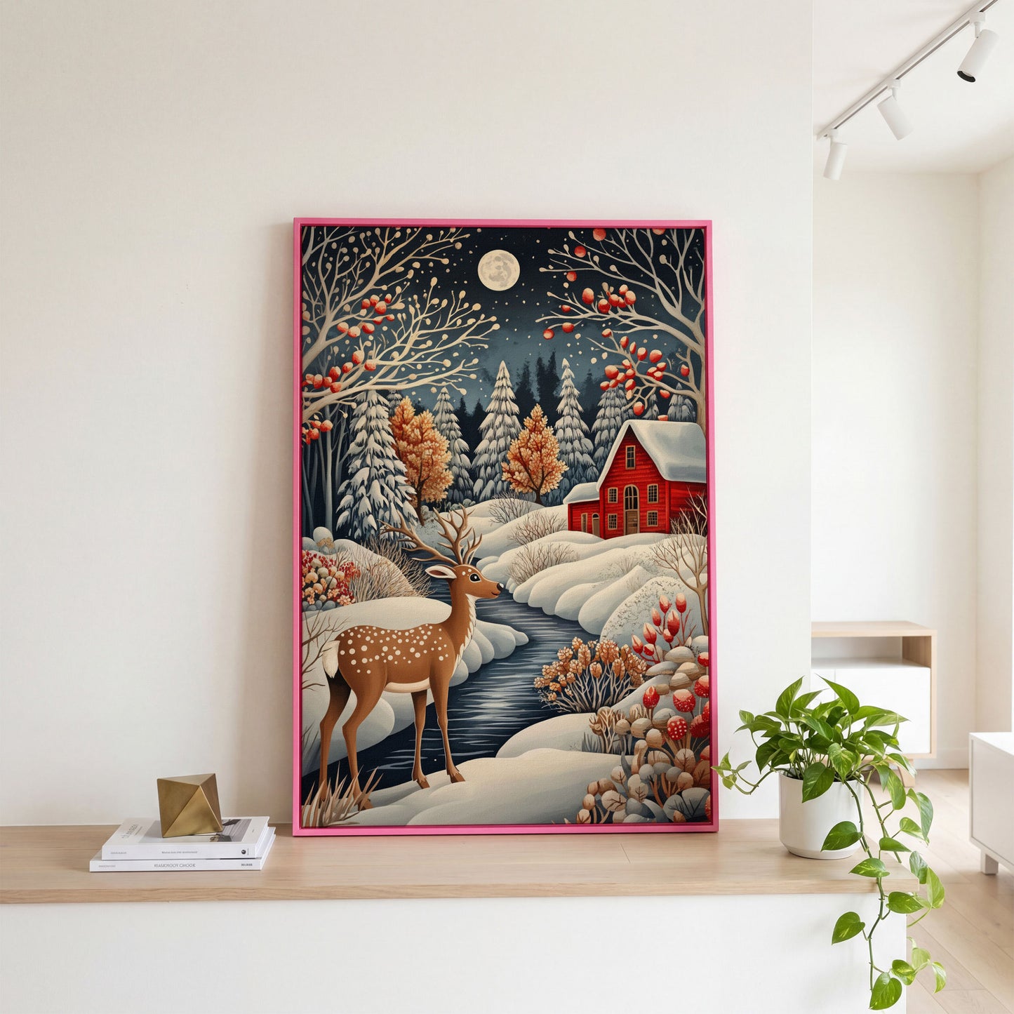 Winter Cottage with Deer Canvas Print in pink floating frame