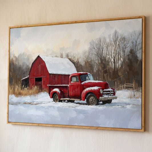 Red Barn and Pickup Truck in Snow Canvas Print shown in white oak floating frame