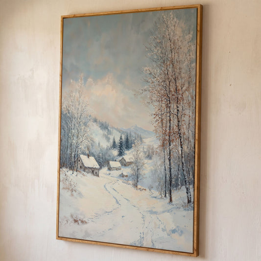 Snowy Village Path Canvas Wall Art shown in white oak floating frame
