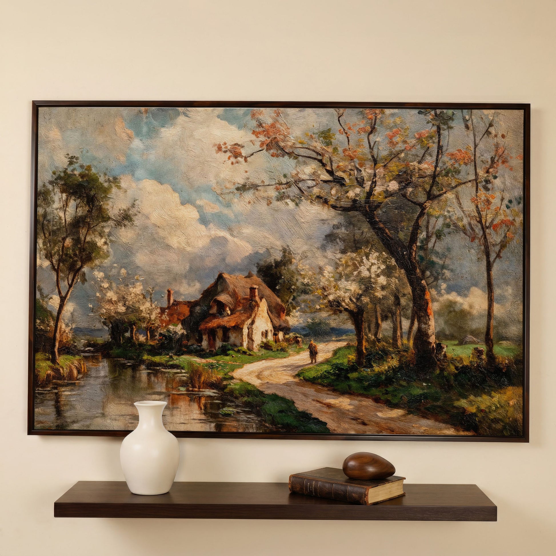 Irish Cottage Landscape Canvas Art with River and Walking Figure in dark walnut floating frame