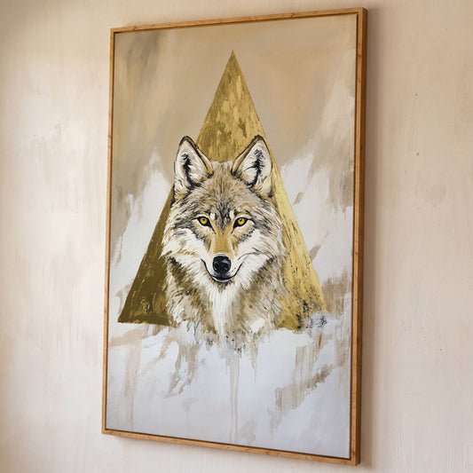 Wolf Portrait Canvas Art with Golden Geometric Triangle shown in white oak floating frame
