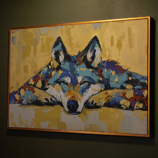 Resting Wolf Canvas Wall Art, Wildlife Print shown in antique gold floating frame
