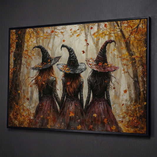 Three Witches Walking Through a Fall Forest Canvas Wall Art shown in black floating frame