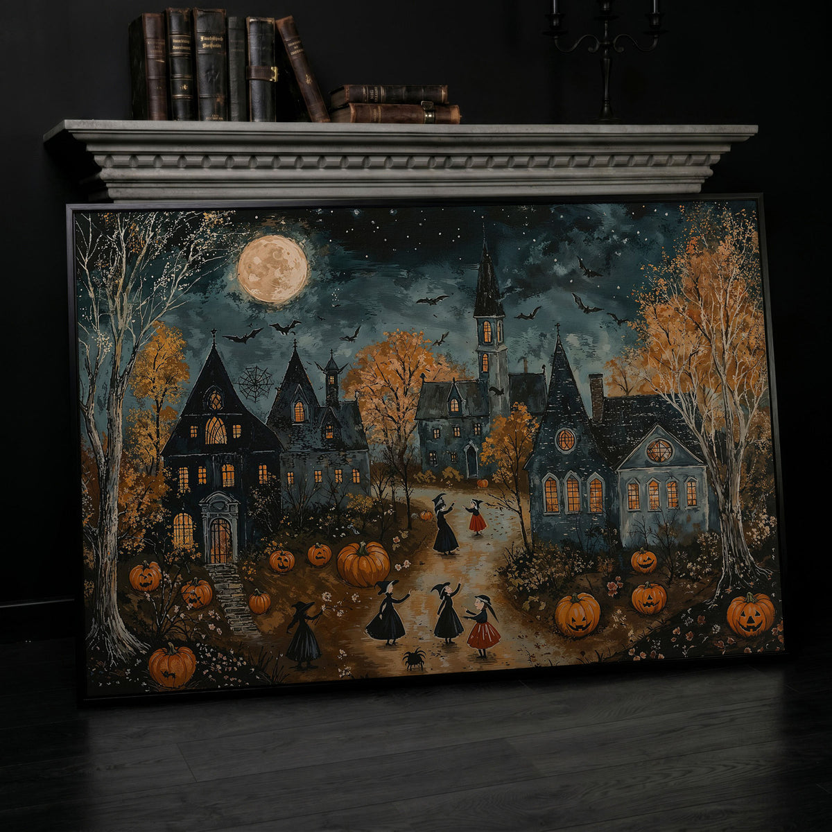 Spooky Village with Pumpkins Canvas in black floating frame