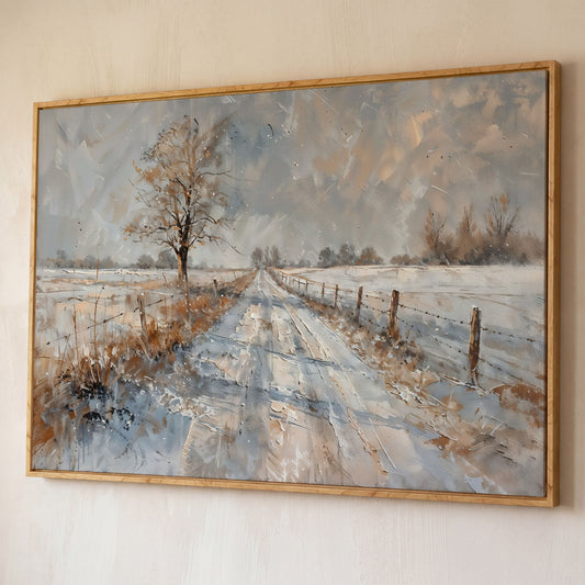 Snowy Road with Bare Tree Canvas Art shown in white oak floating frame