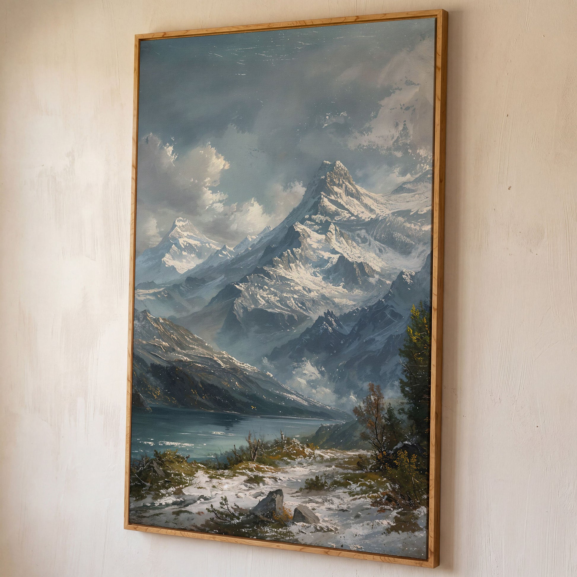 Snowy Mountain with Frozen Lake Canvas Print shown in white oak floating frame
