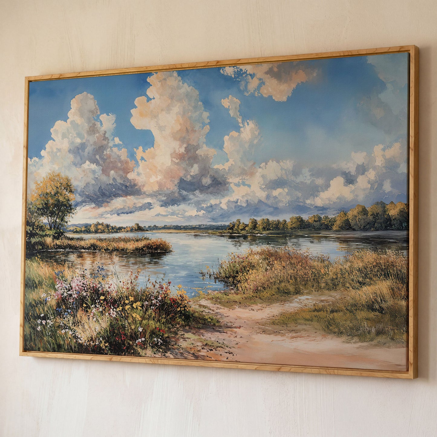 Lake Reflections with Wildflowers and Cloud-Filled Sky Canvas Art shown in white oak floating frame