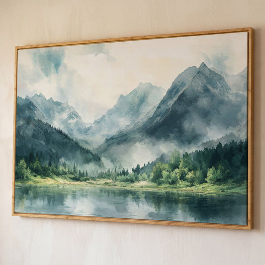 Watercolor Mountains and Forest Canvas Print shown in white oak floating frame