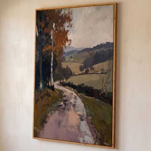 Winding Autumn Road Through Rolling Hills Canvas Wall Art shown in white oak floating frame