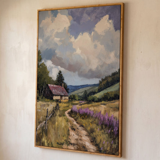 Peaceful Countryside Landscape with Purple Wildflowers canvas shown in white oak floating frame