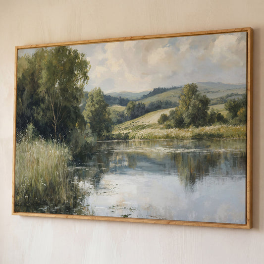 Rolling Hills and Still Water Landscape Canvas Wall Art shown in white oak floating frame