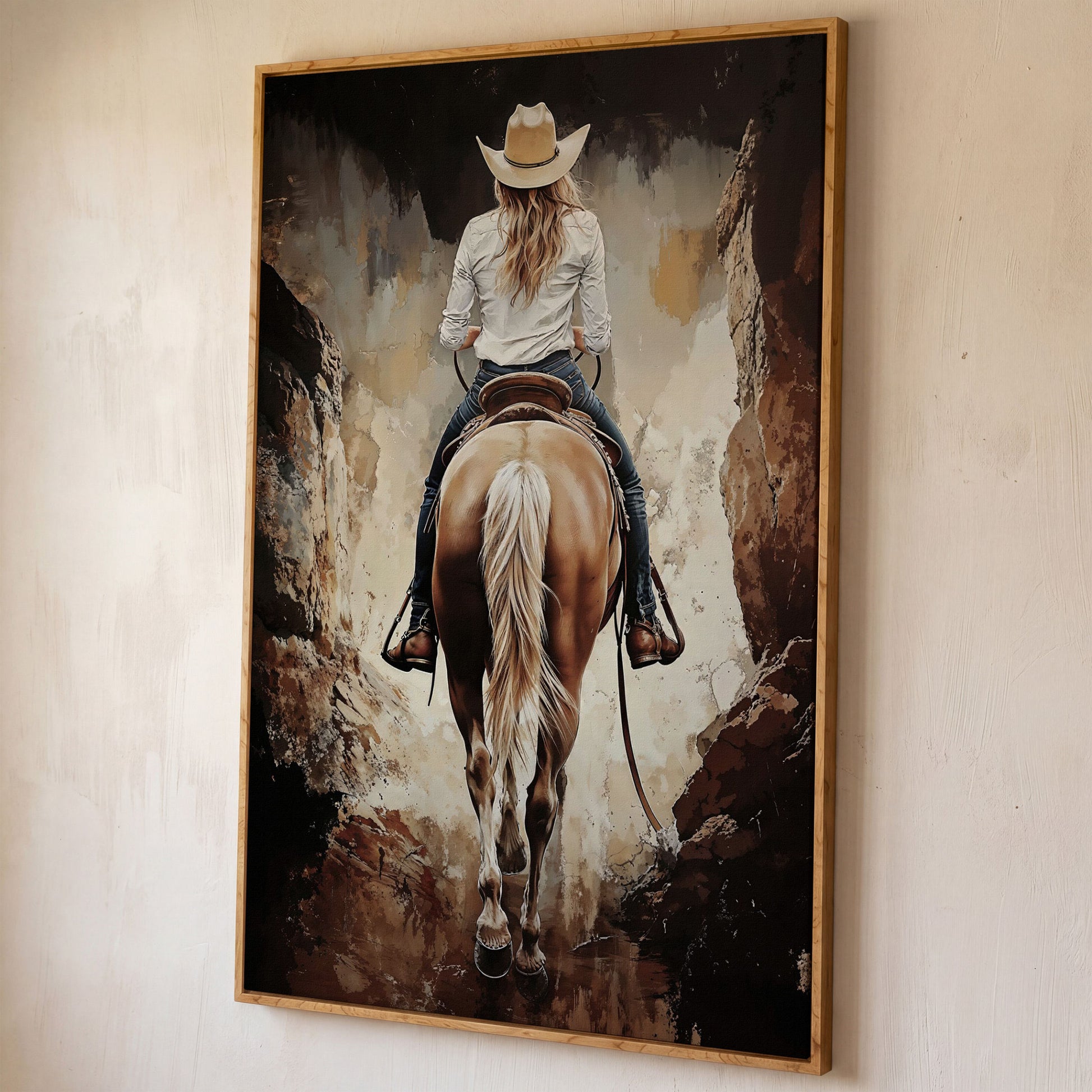 Cowgirl in the Canyon. Western Horse Canvas Wall Art shown in white oak floating frame