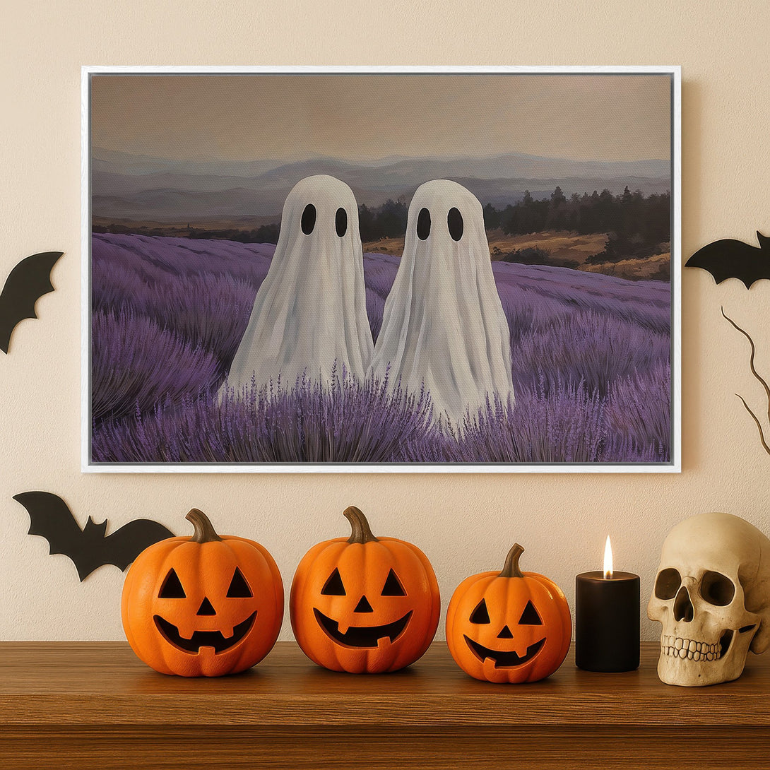 Framed Wall Art: Spooky Halloween canvas print featuring two friendly ghosts in a lavender field. Soft color palette, perfect for fall decor.