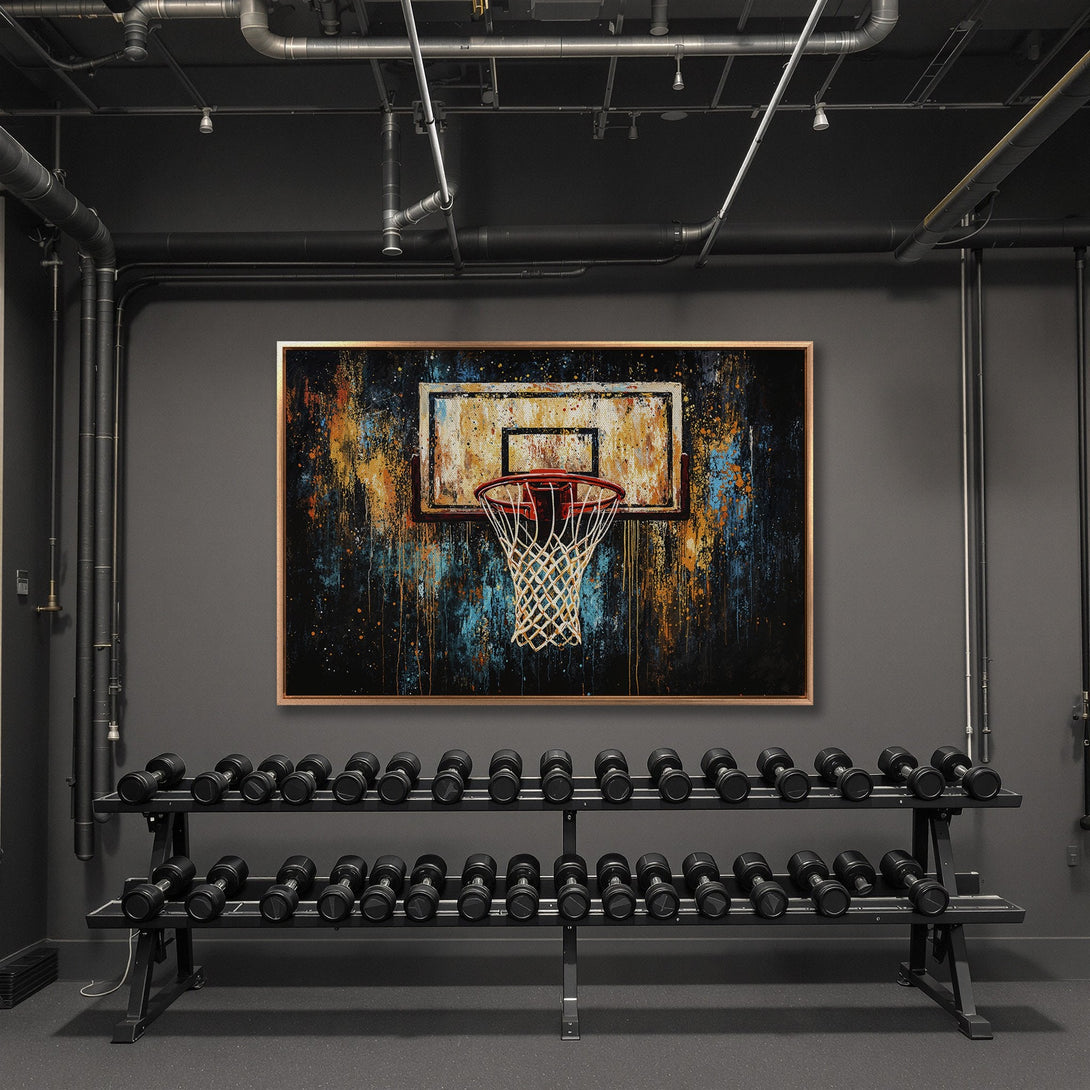 Framed Wall Art: Abstract basketball hoop art with vibrant orange, blue, and gold splashes. Modern canvas print for gym or sports decor.