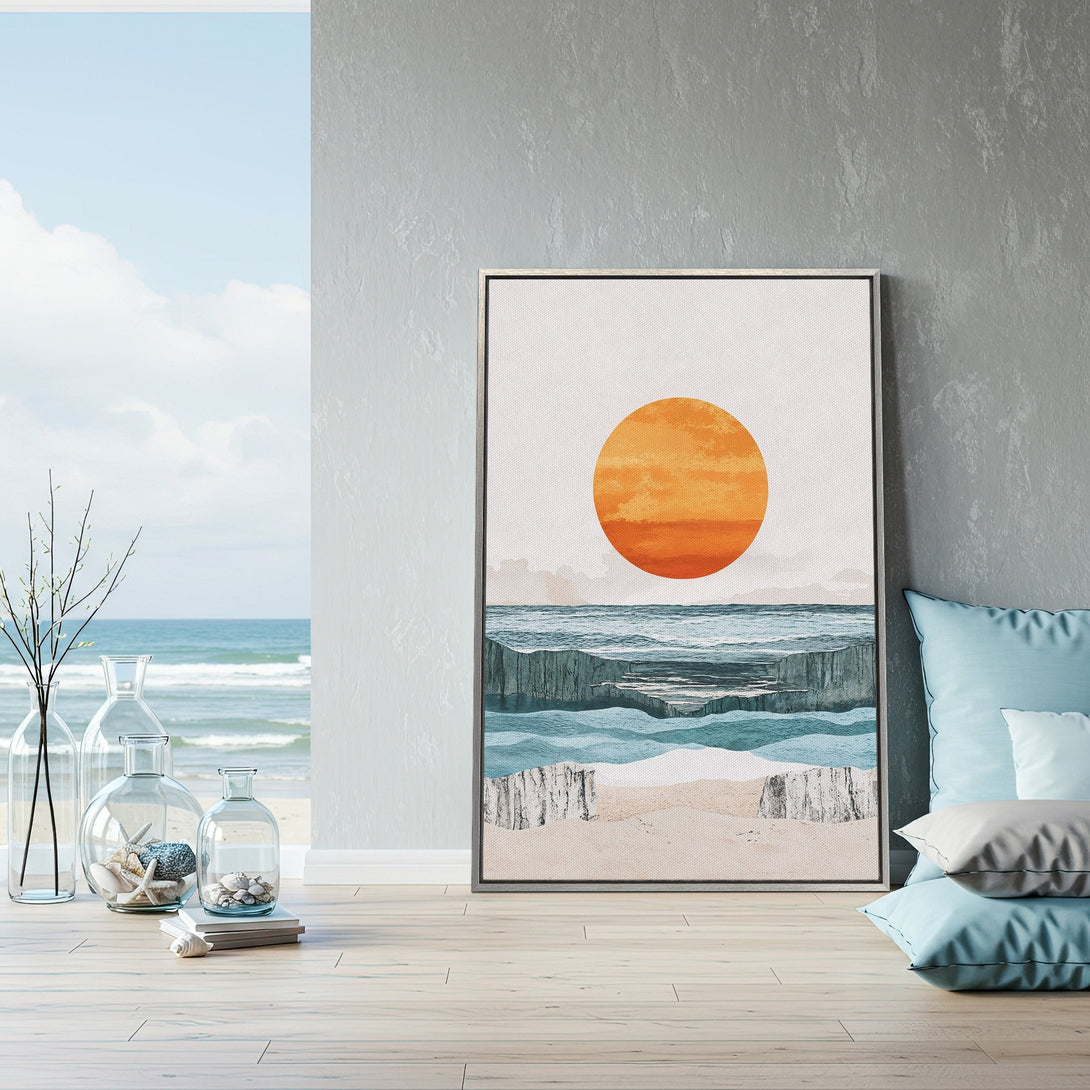 Framed Wall Art featuring a coastal sunset scene in calming blues and oranges. Perfect for adding a touch of serenity to your home decor.