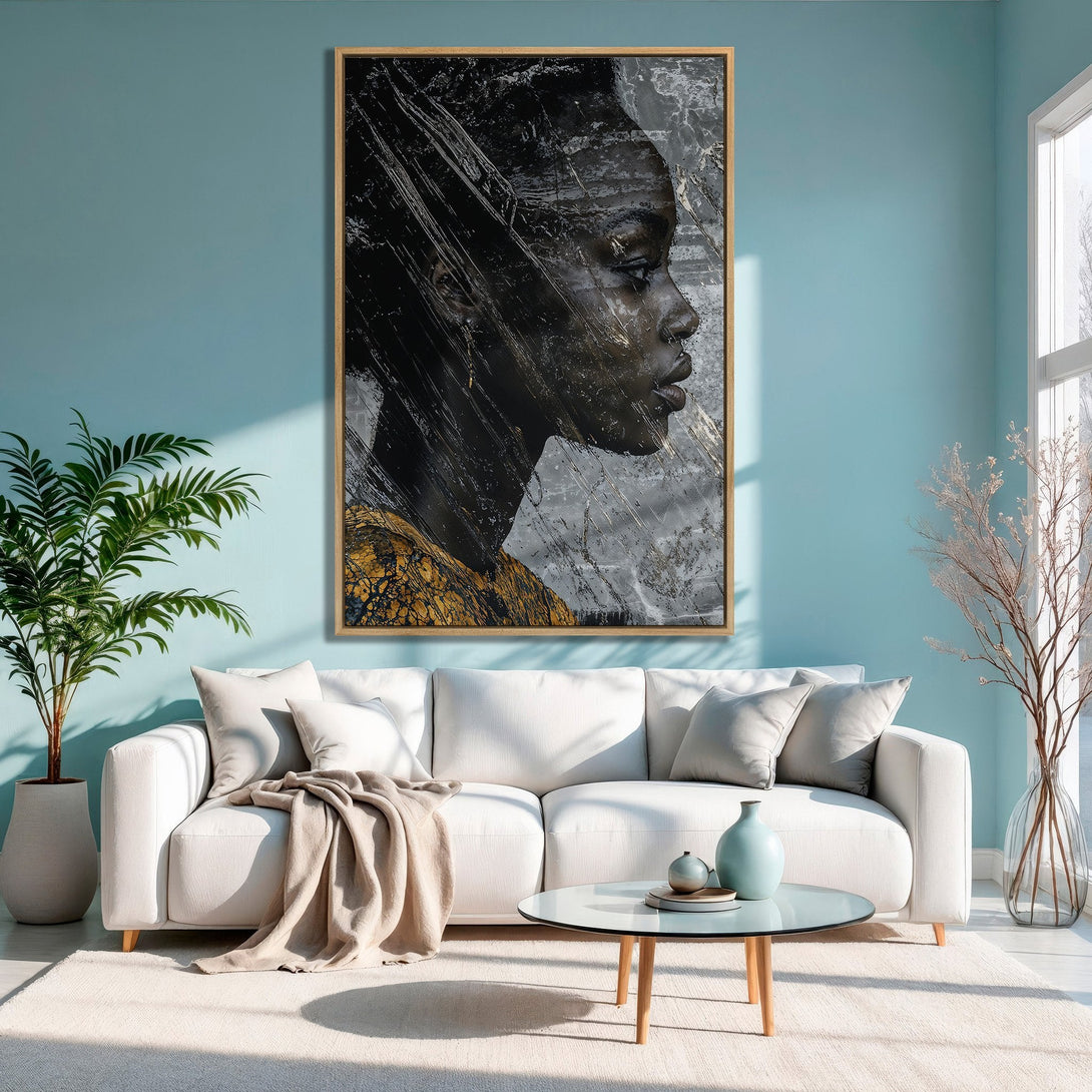 Framed Wall Art: Abstract portrait in black, gold, and gray tones. Modern art canvas print adds a touch of elegance to any living room with a teal wall.