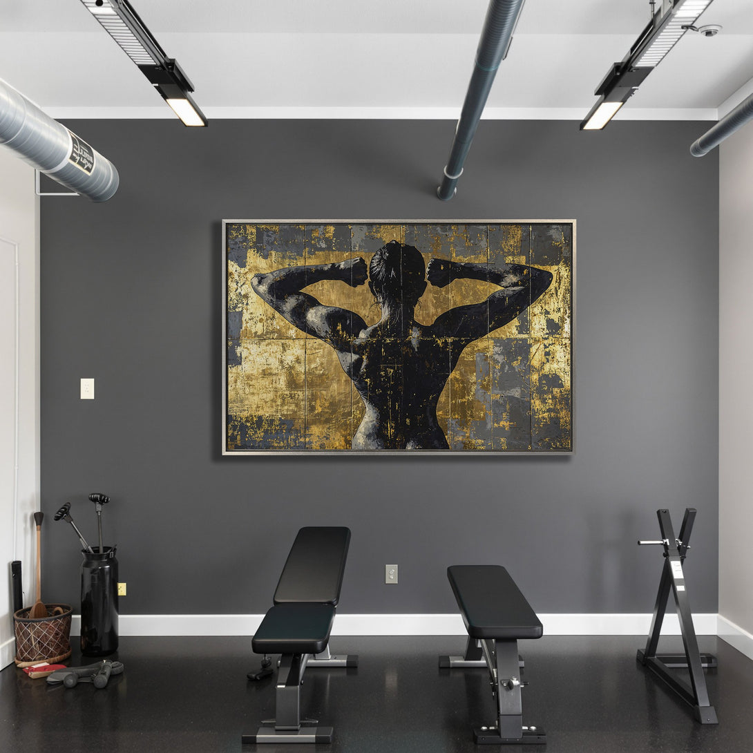 Framed Wall Art featuring a muscular figure in black and gold abstract style, perfect for a modern gym or home decor, available now!
