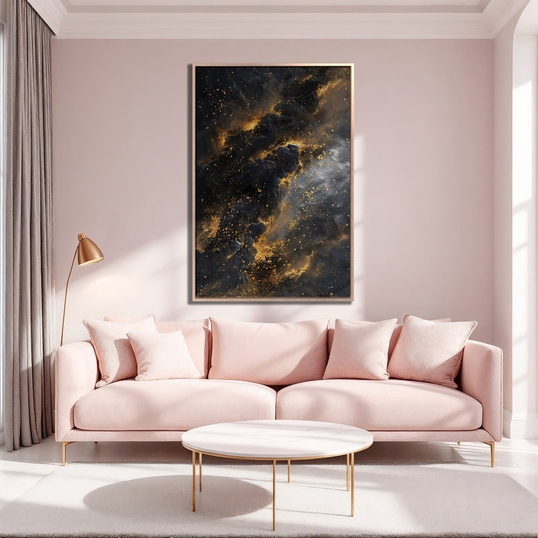 Framed Wall Art: Abstract black & gold canvas print in a modern living room. Features a pink sofa, gold accents, and a blush color palette.