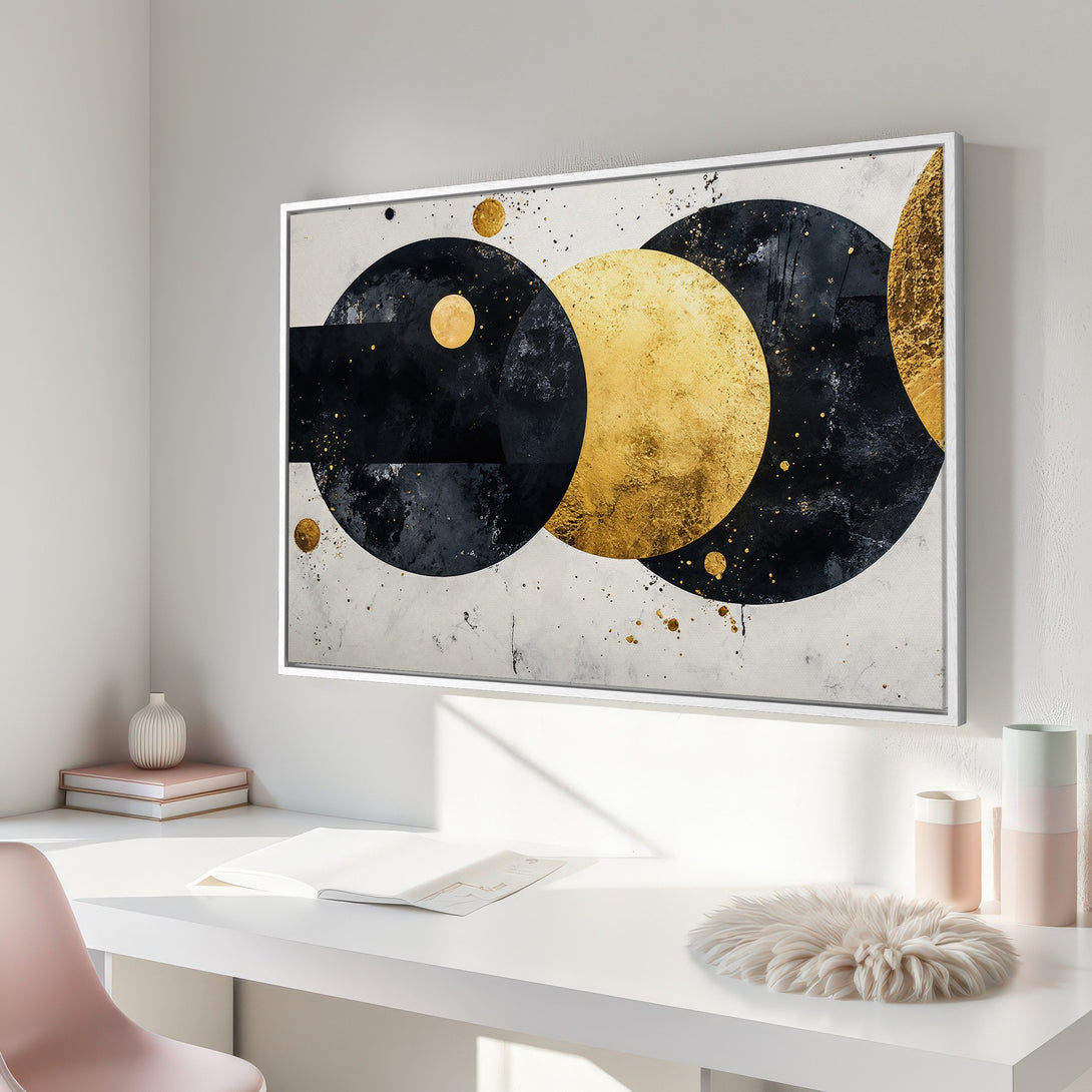 Framed Wall Art featuring abstract gold and black circles. Modern art canvas print, perfect for adding a touch of elegance to any interior.