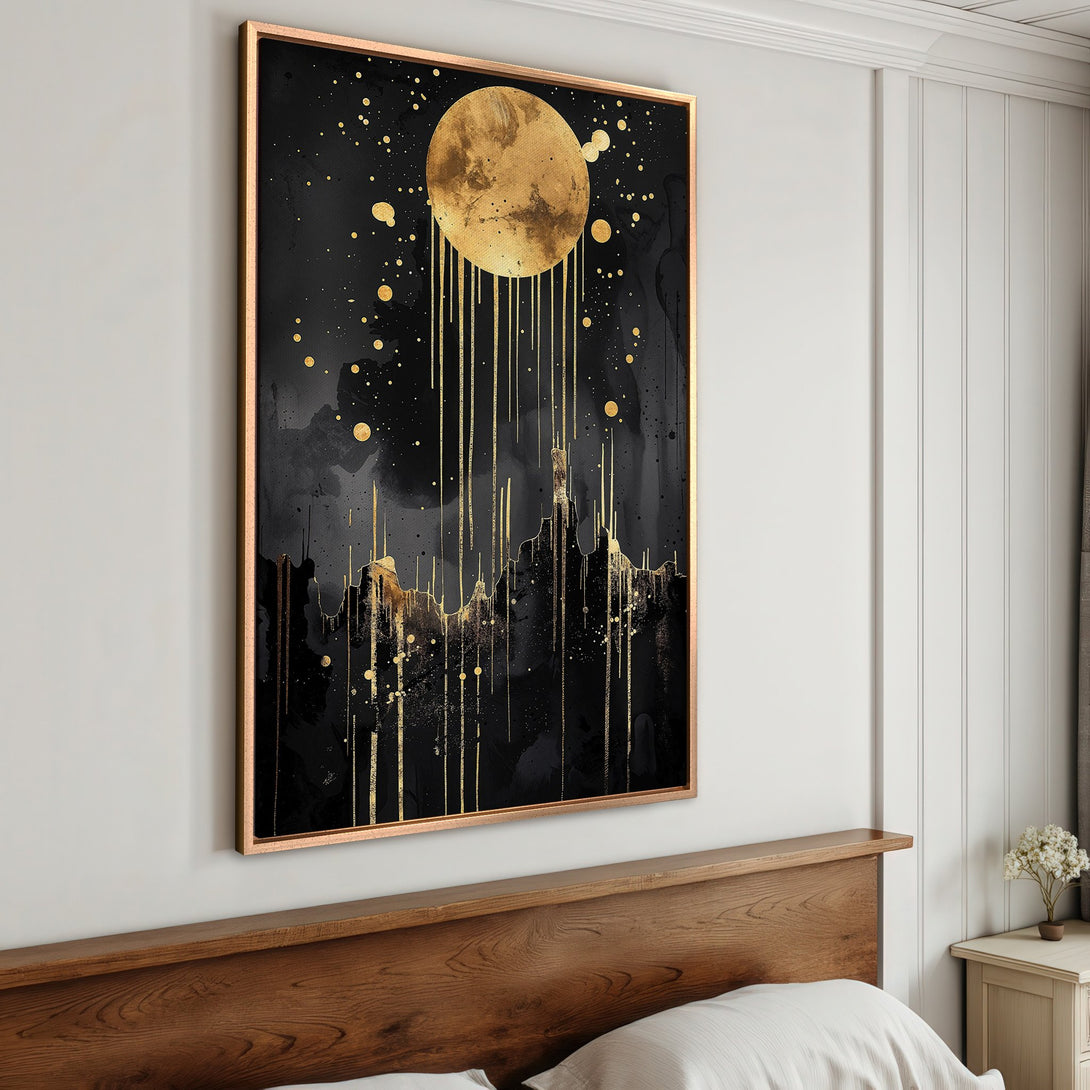 Framed Wall Art: Abstract gold moon and stars on a black canvas. Modern art piece with a dramatic black and gold color palette. Elevate your space!