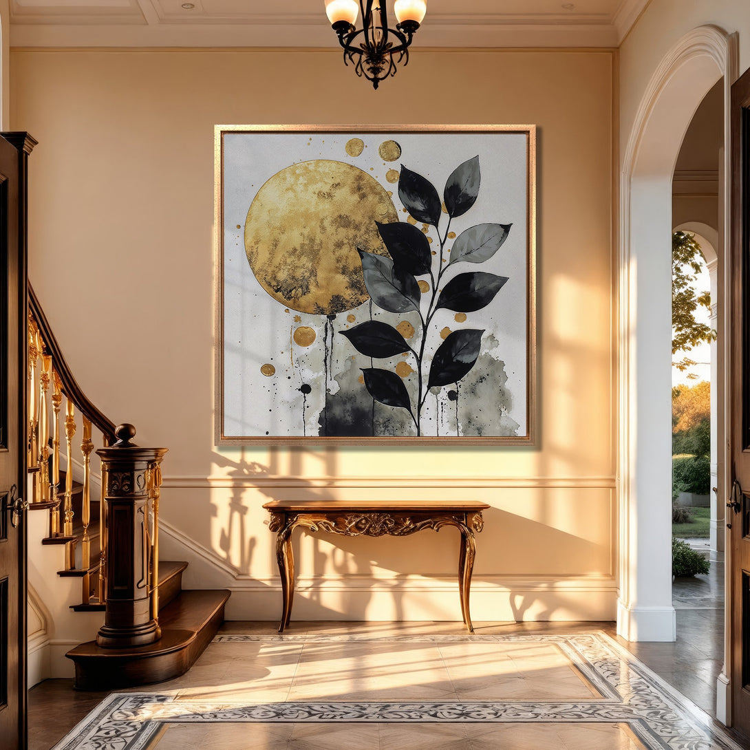 Framed Wall Art showcasing a botanical design with gold and black accents. Modern art piece in a warm, neutral interior. Add elegance to your space!