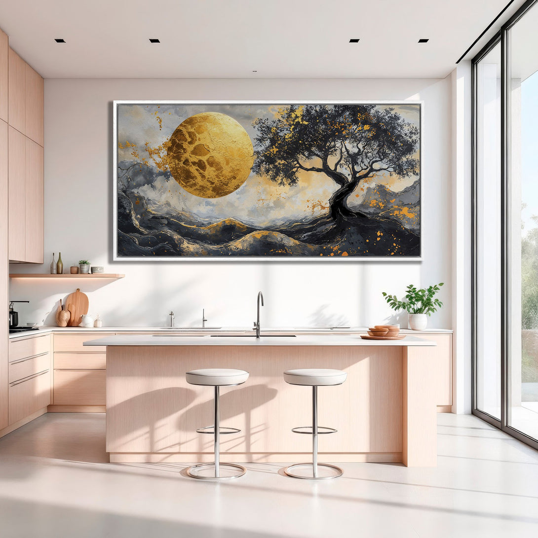 Framed Wall Art featuring a golden moon and tree against a moody, abstract landscape. Modern art with a black, gold, and gray color palette. Perfect for any interior.