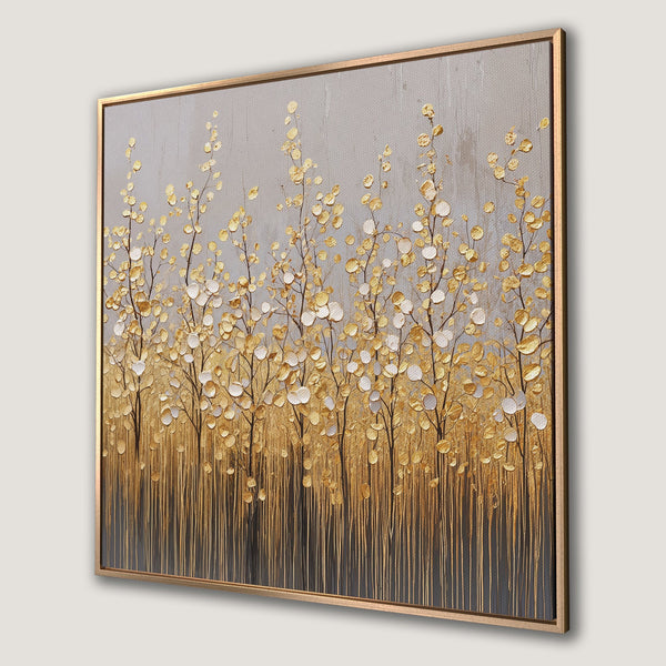 Framed Wall Art featuring gold leaf trees on a textured canvas. Elegant, modern art with a neutral grey and gold color palette, perfect for any decor.