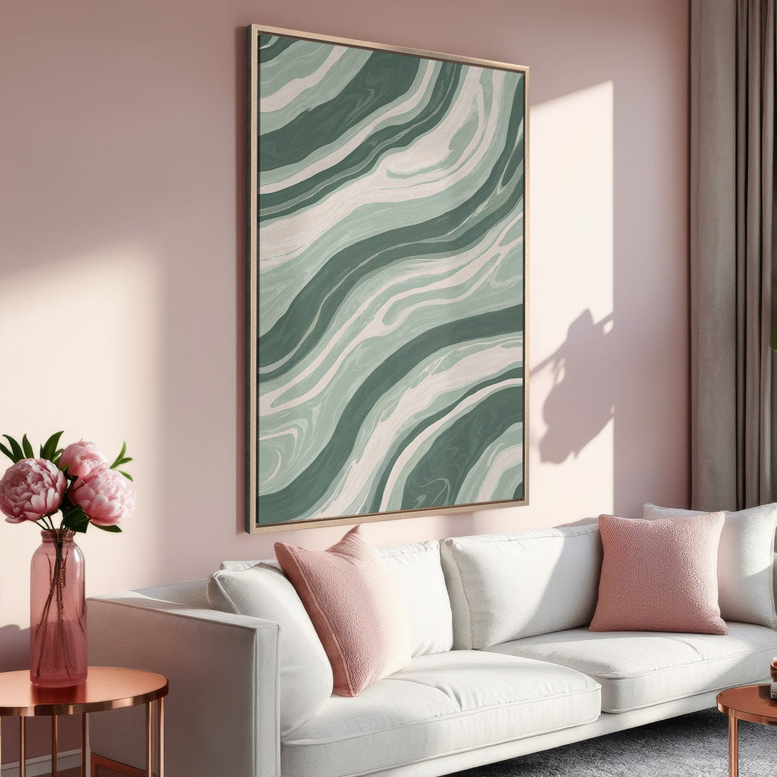 Framed Wall Art featuring abstract green and white waves, displayed in a modern living room with a soft pink color palette. Elevate your space!