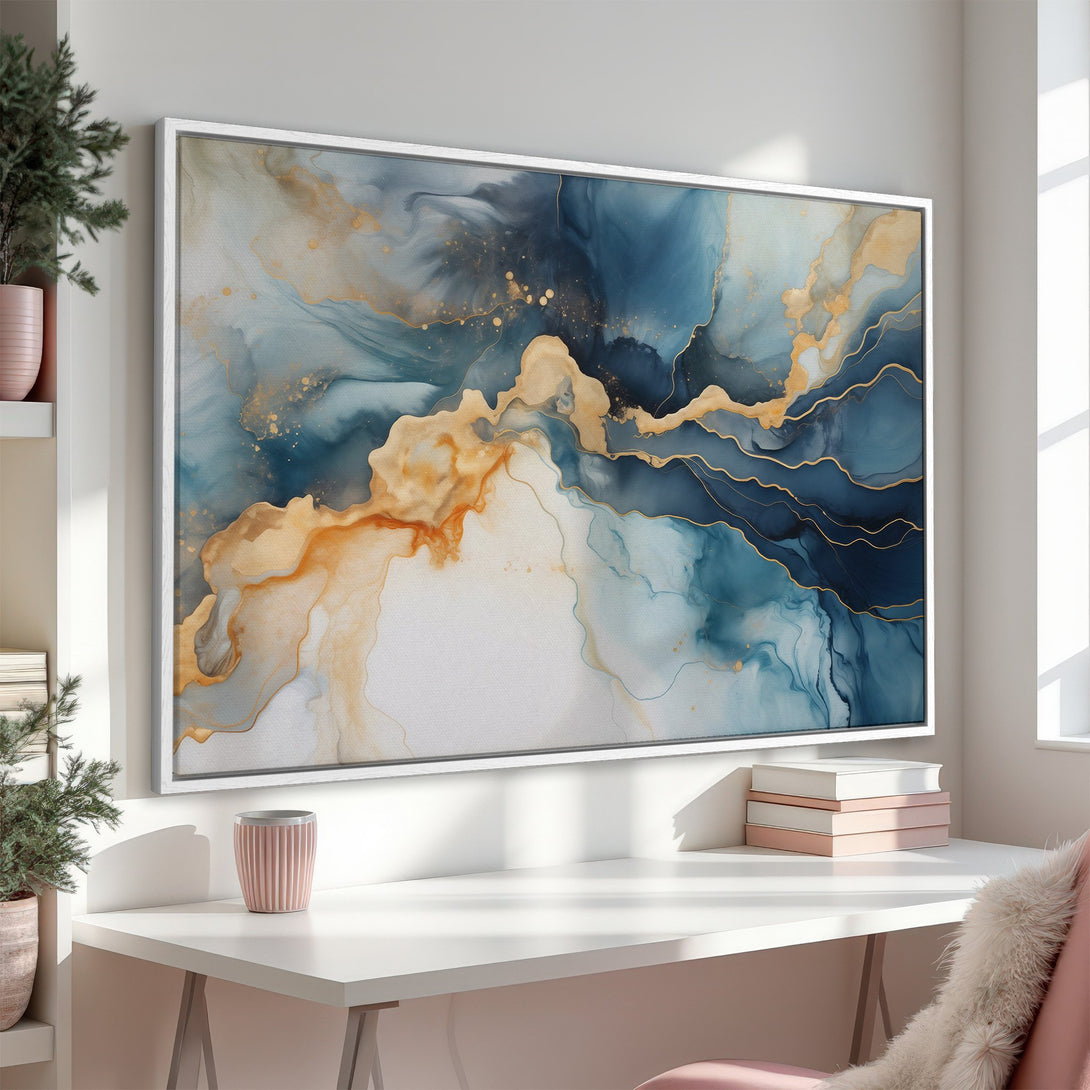 Framed Wall Art featuring abstract watercolor art in blue and gold tones. Add a touch of elegance to your space!